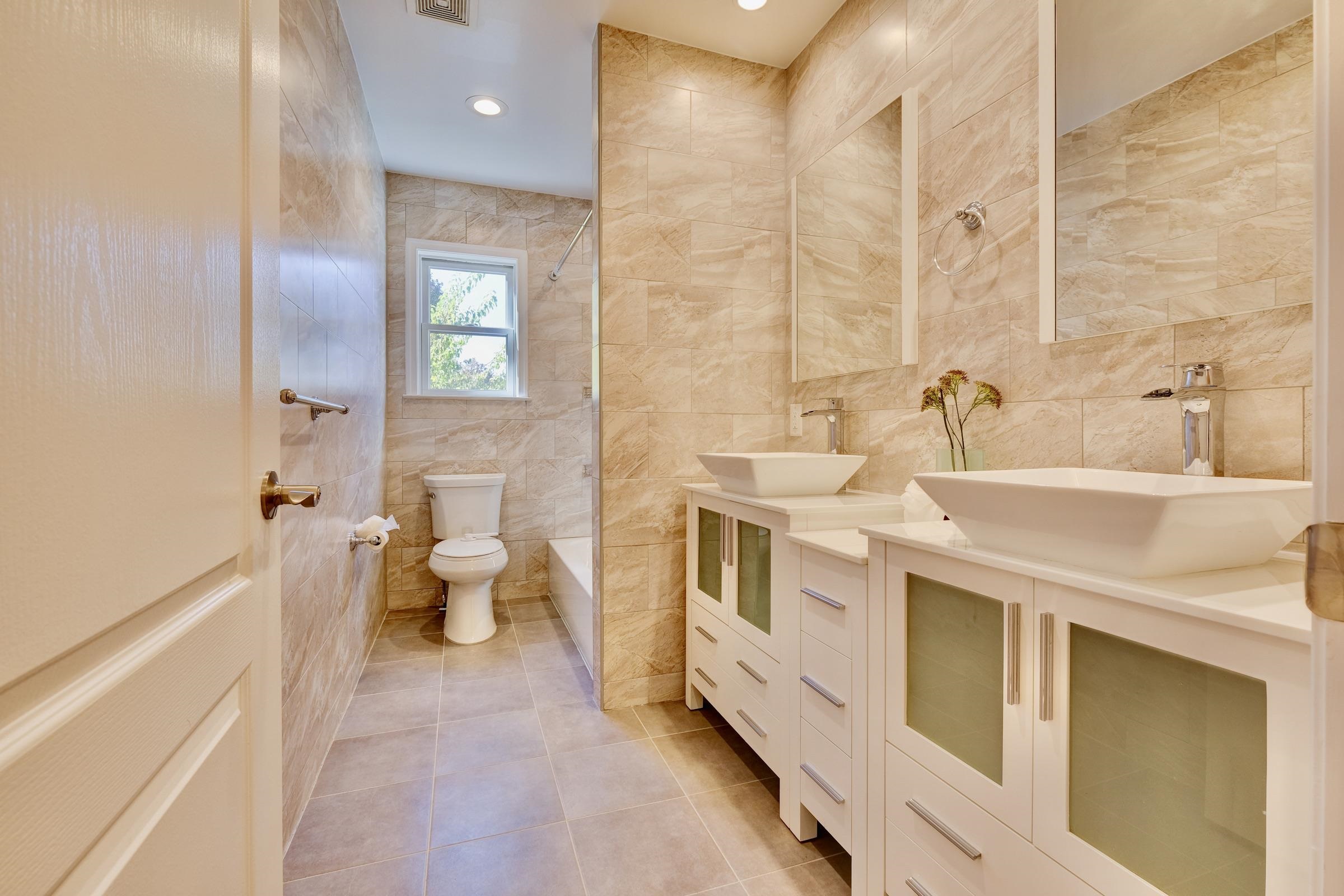 726 Chestnut Street, Unit B Secaucus, NJ 07094 - Photo 32 of 50 a bathroom with a sink a toilet and shower