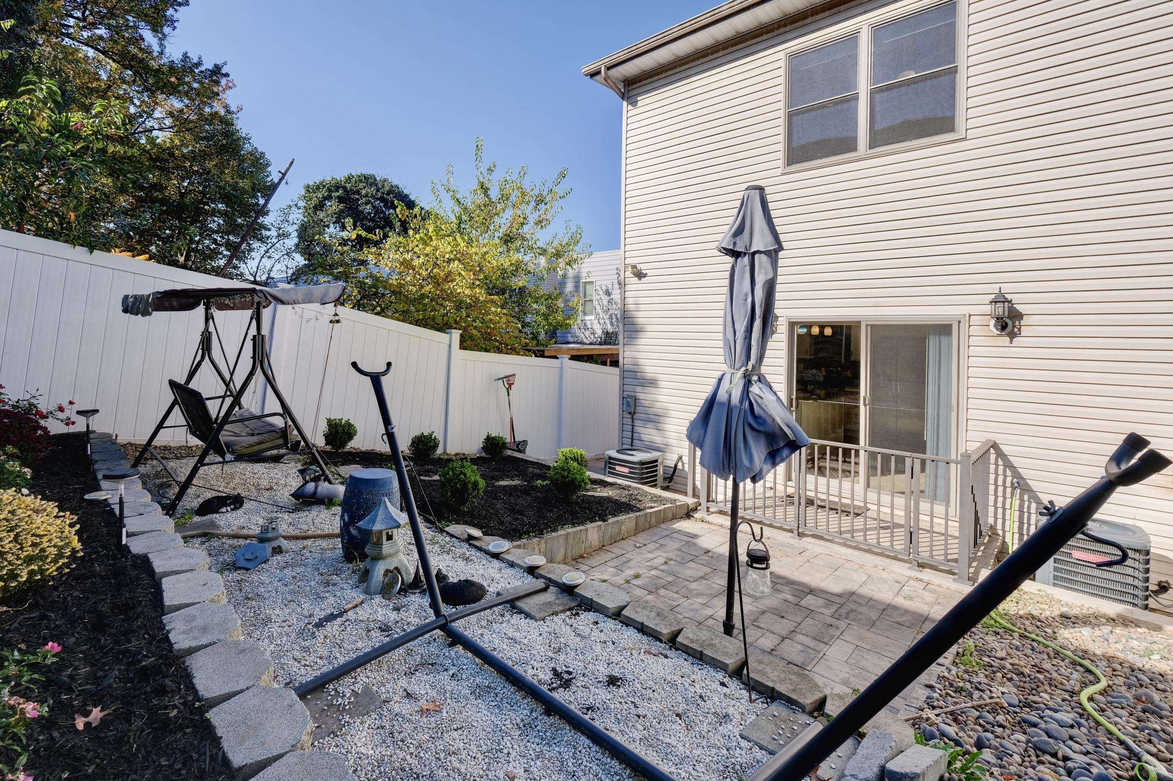 726 Chestnut Street, Unit B Secaucus, NJ 07094 - Photo 45 of 50 a view of a house with backyard