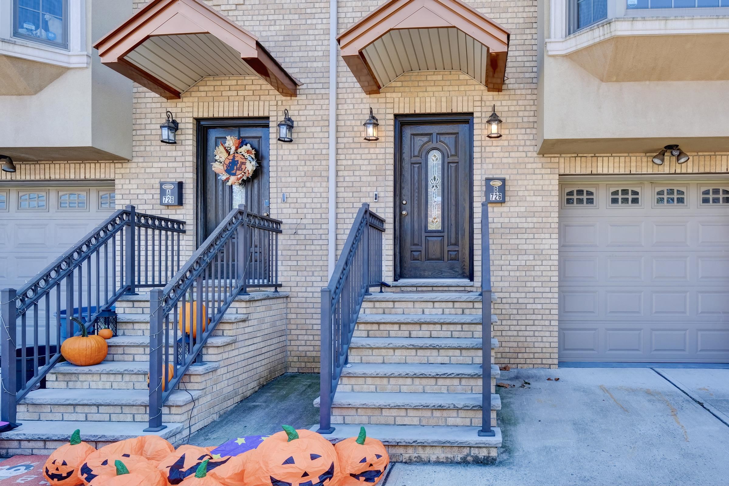 726 Chestnut Street, Unit B Secaucus, NJ 07094 - Photo 48 of 50 a view of front door of house with wooden deck