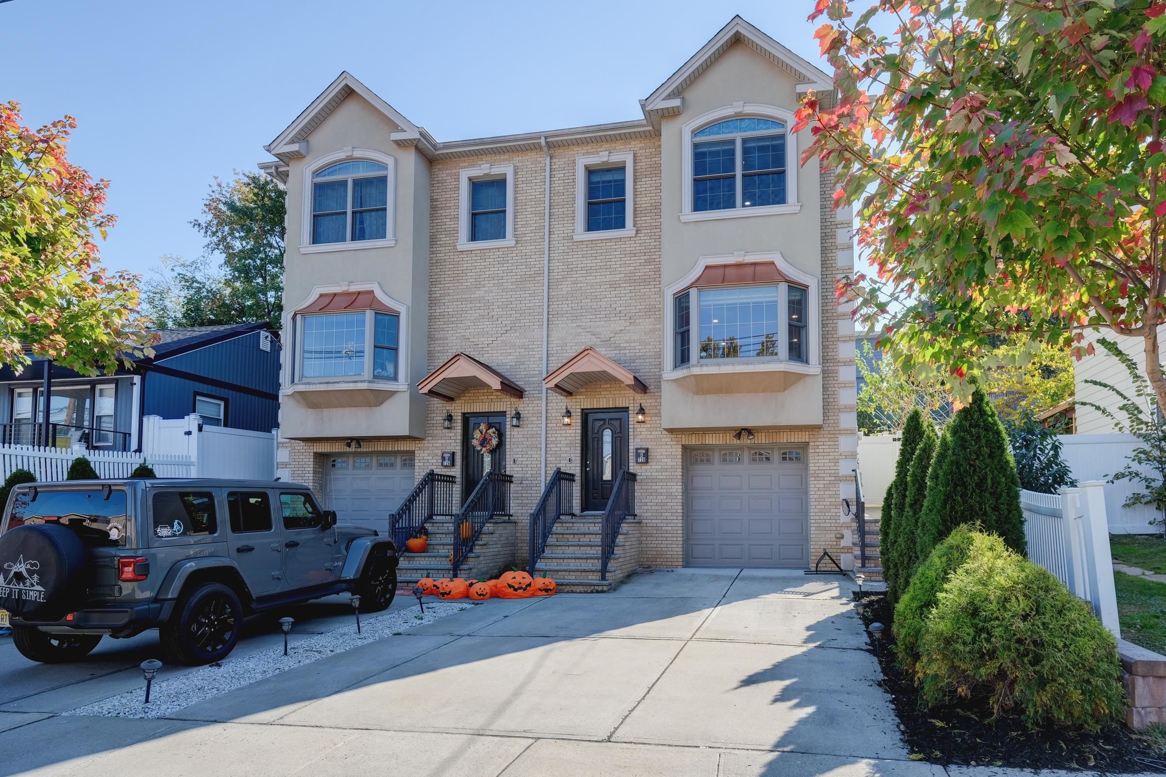 726 Chestnut Street, Unit B Secaucus, NJ 07094 - Photo 49 of 50 a front view of a house with parking space