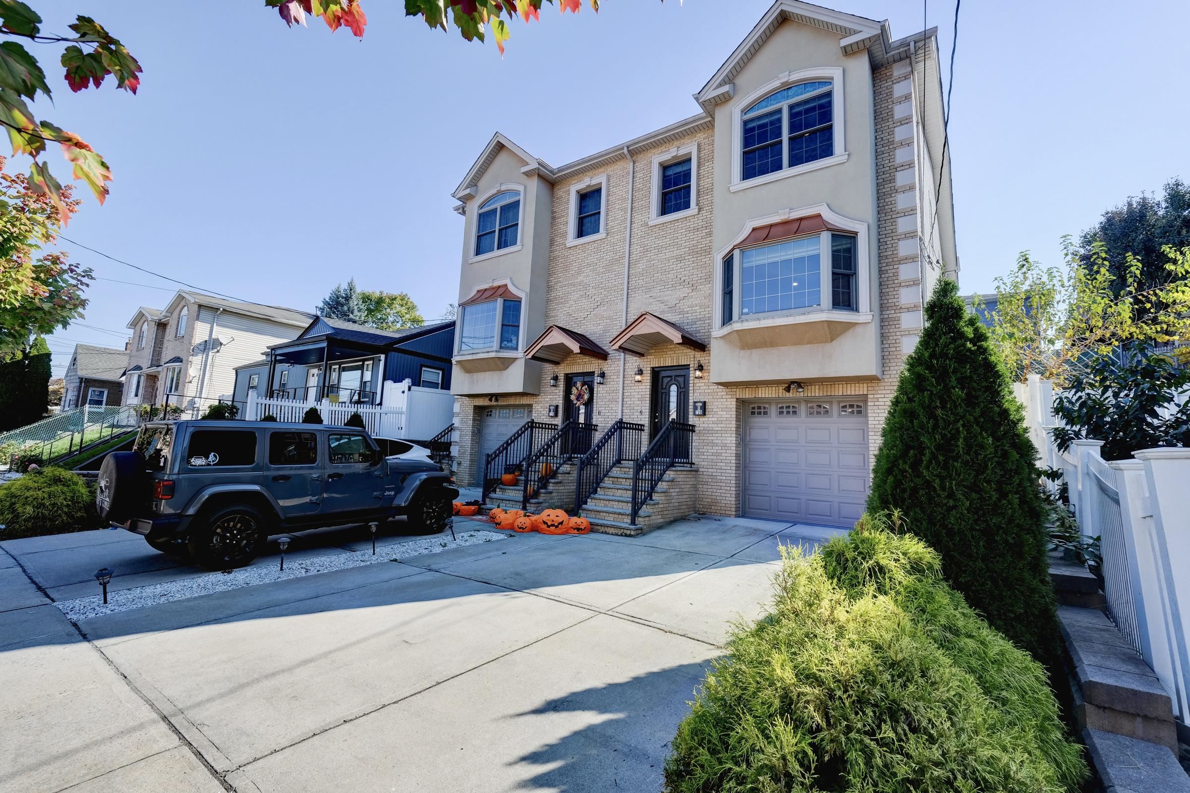 726 Chestnut Street, Unit B Secaucus, NJ 07094 - Photo 50 of 50 a front view of a house with lots of green space