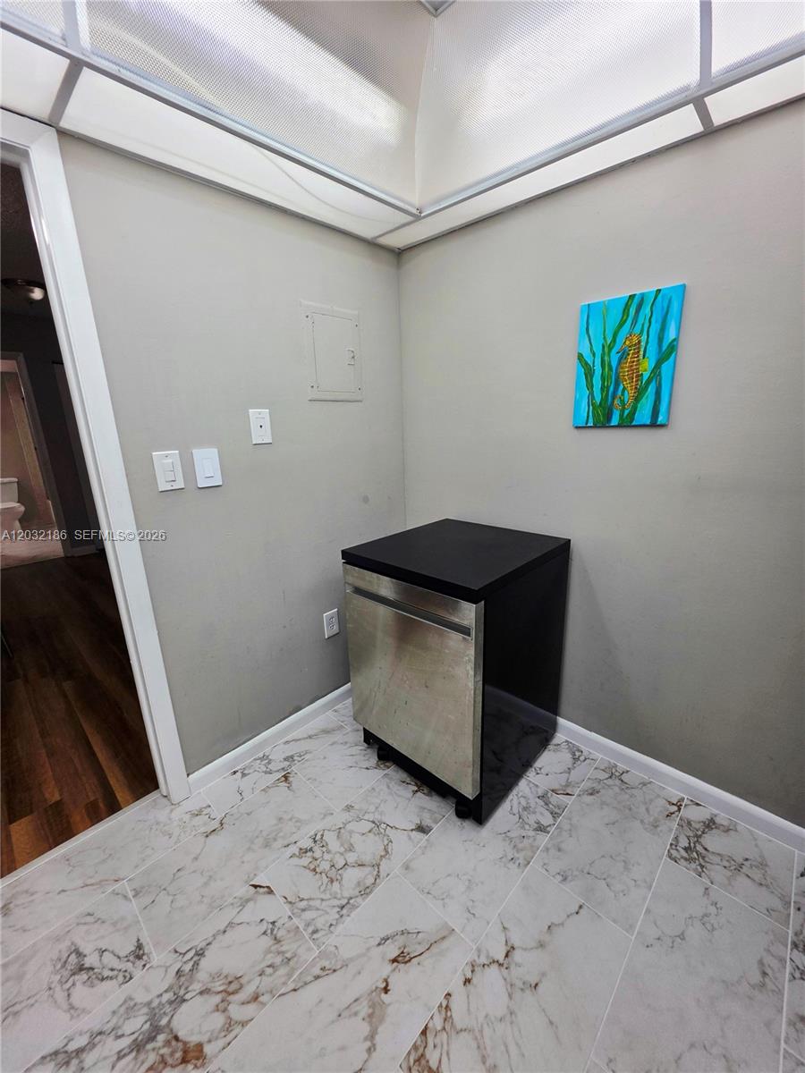 4164 Inverrary Drive, Unit 204 Lauderhill, FL 33319 - Photo 15 of 28 a room with a bed and a stove top oven