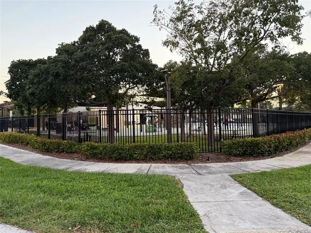 a view of a backyard with green space