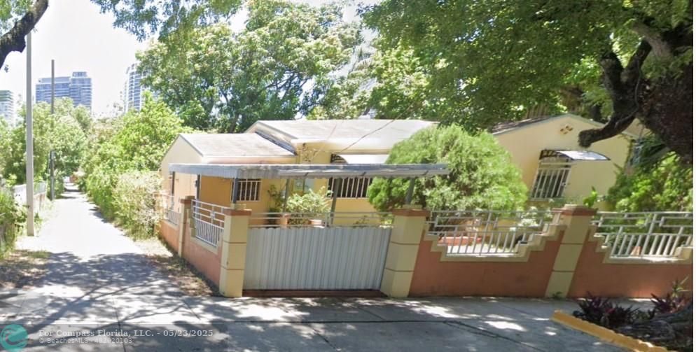 3411 Northwest 1st Avenue Miami, FL 33127 - Photo 2 of 5 a view of a house with a yard