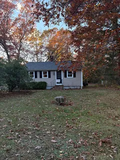 a house view with a garden space
