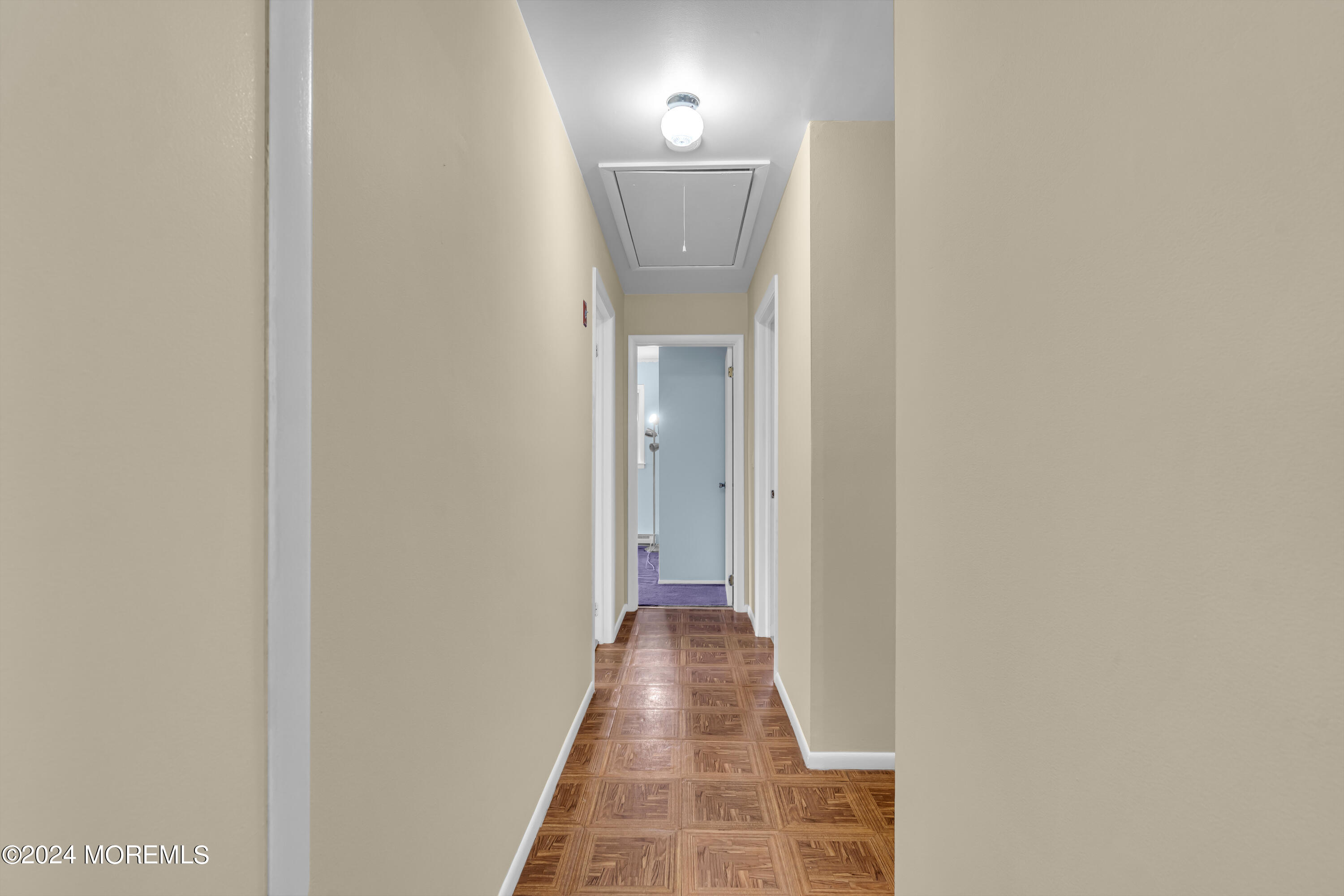 419 Cook Road Jackson, NJ 08527 - Photo 13 of 36 a view of a hallway with wooden floor