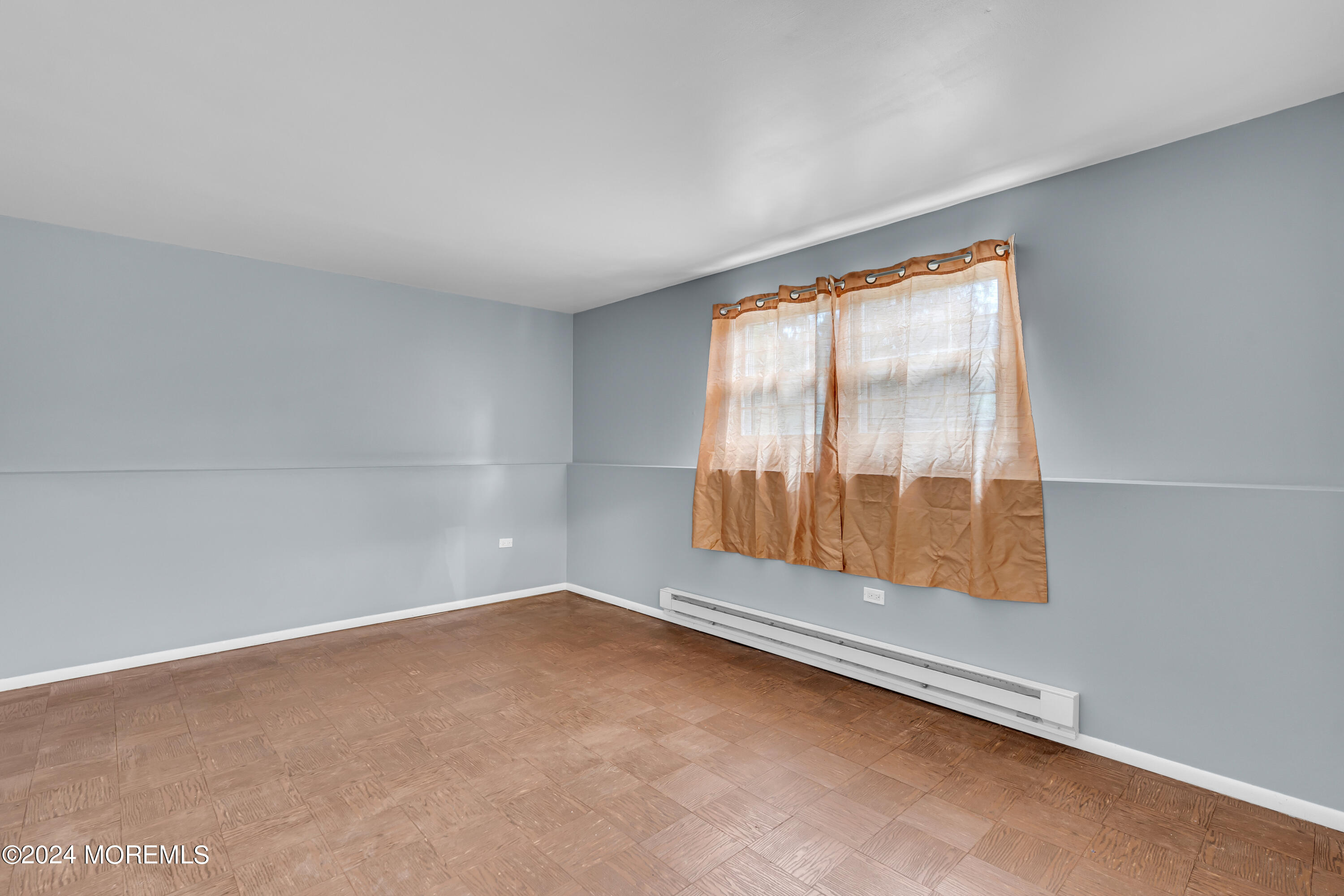 419 Cook Road Jackson, NJ 08527 - Photo 28 of 36 an empty room with windows
