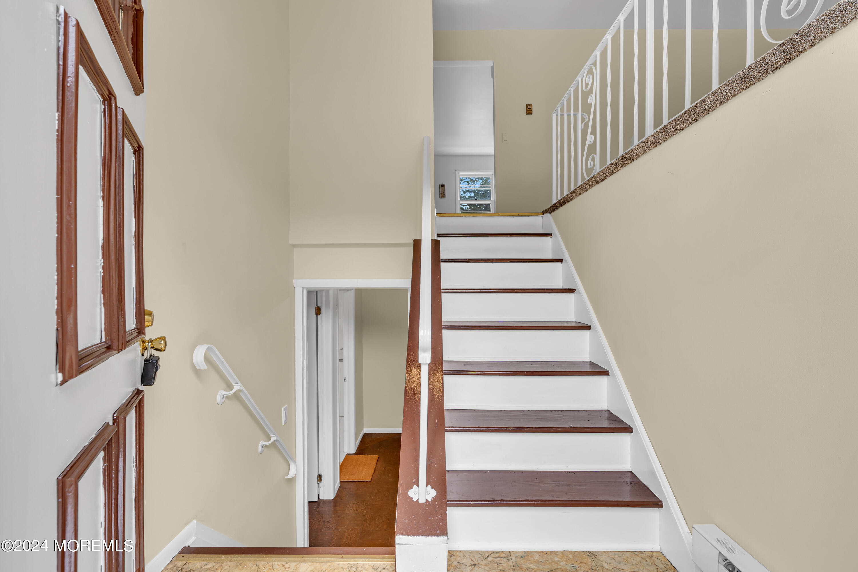 419 Cook Road Jackson, NJ 08527 - Photo 4 of 36 a view of staircase with wooden floor and white walls