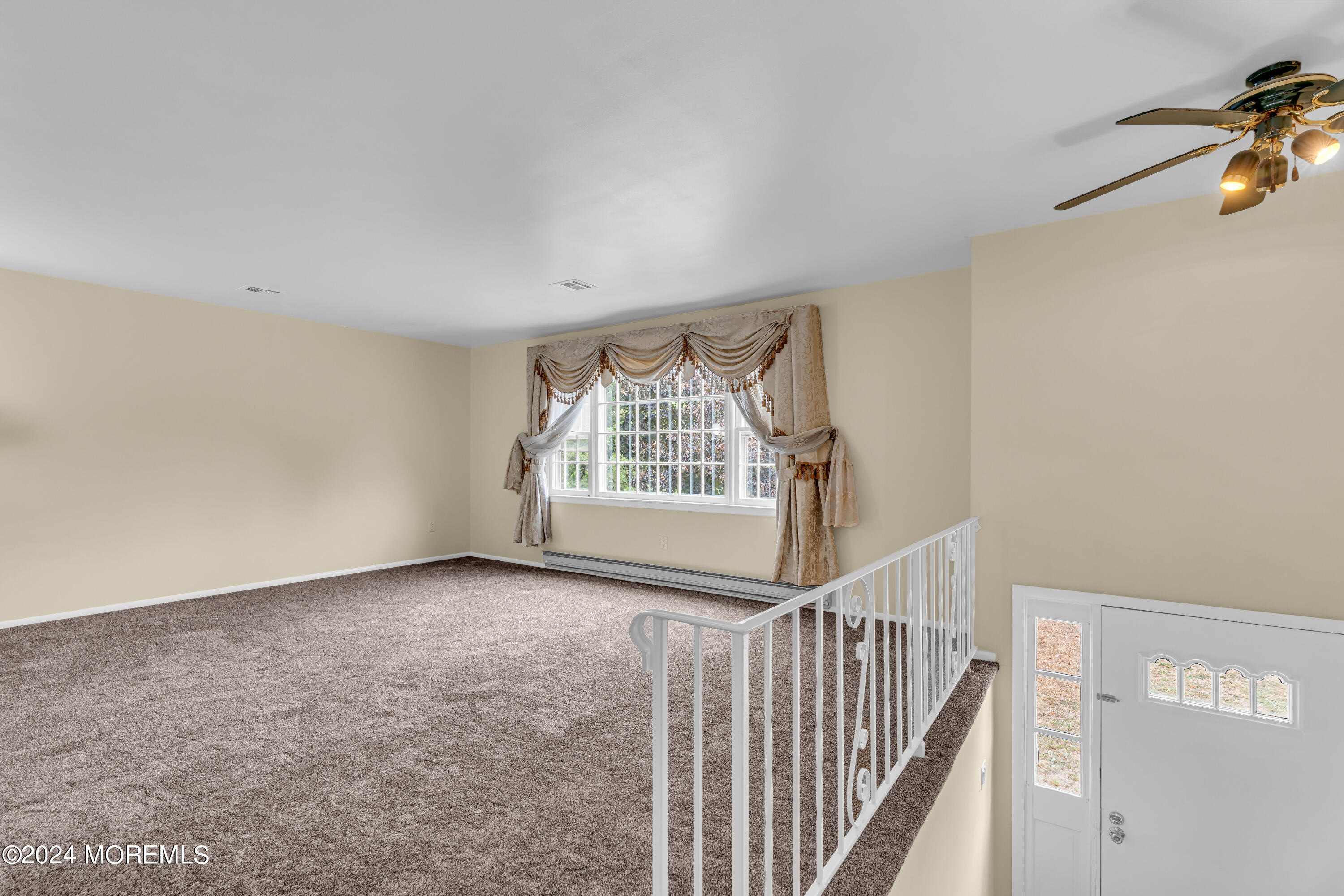 419 Cook Road Jackson, NJ 08527 - Photo 5 of 36 a view of an empty room with stairs