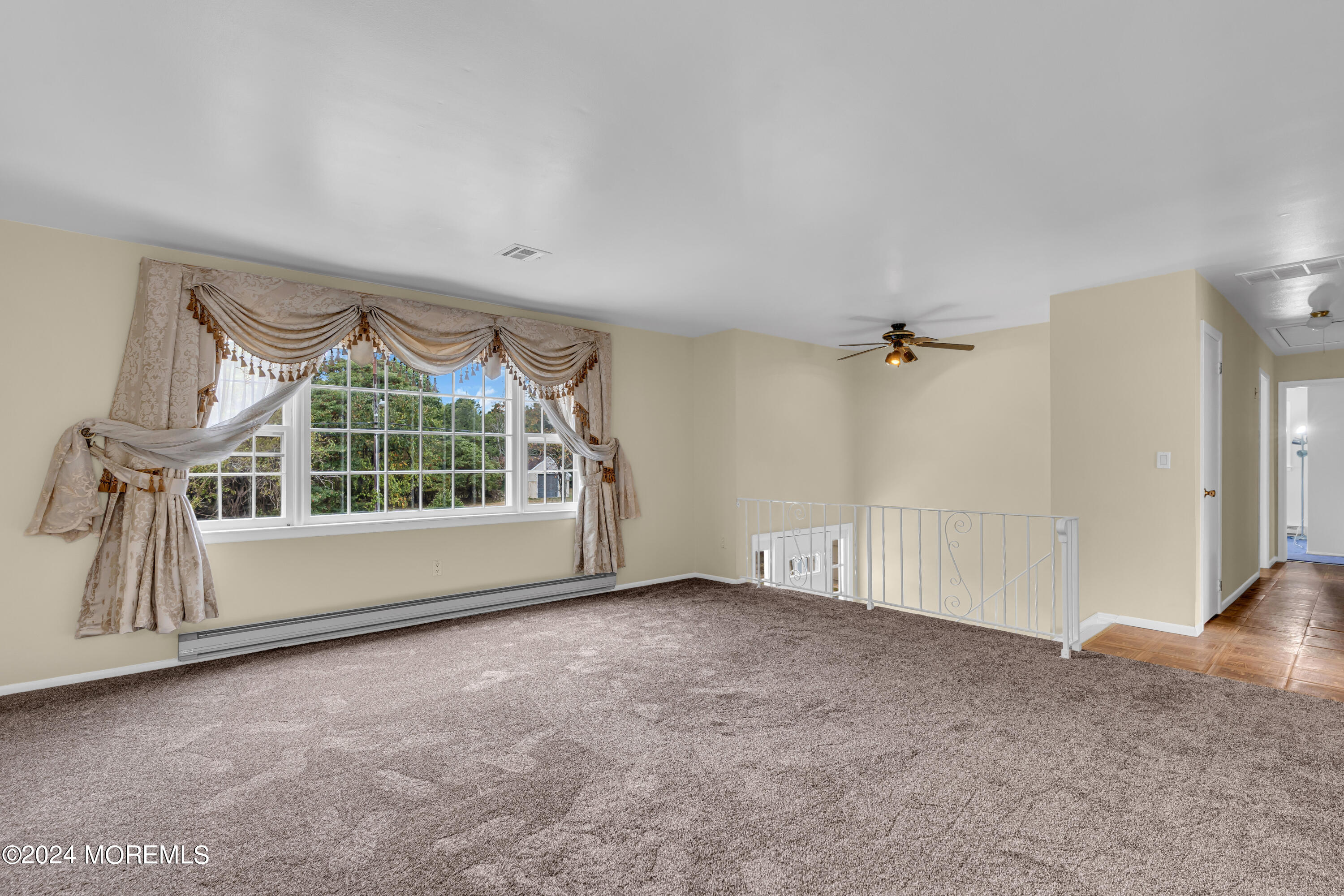 419 Cook Road Jackson, NJ 08527 - Photo 6 of 36 a view of an empty room with a window