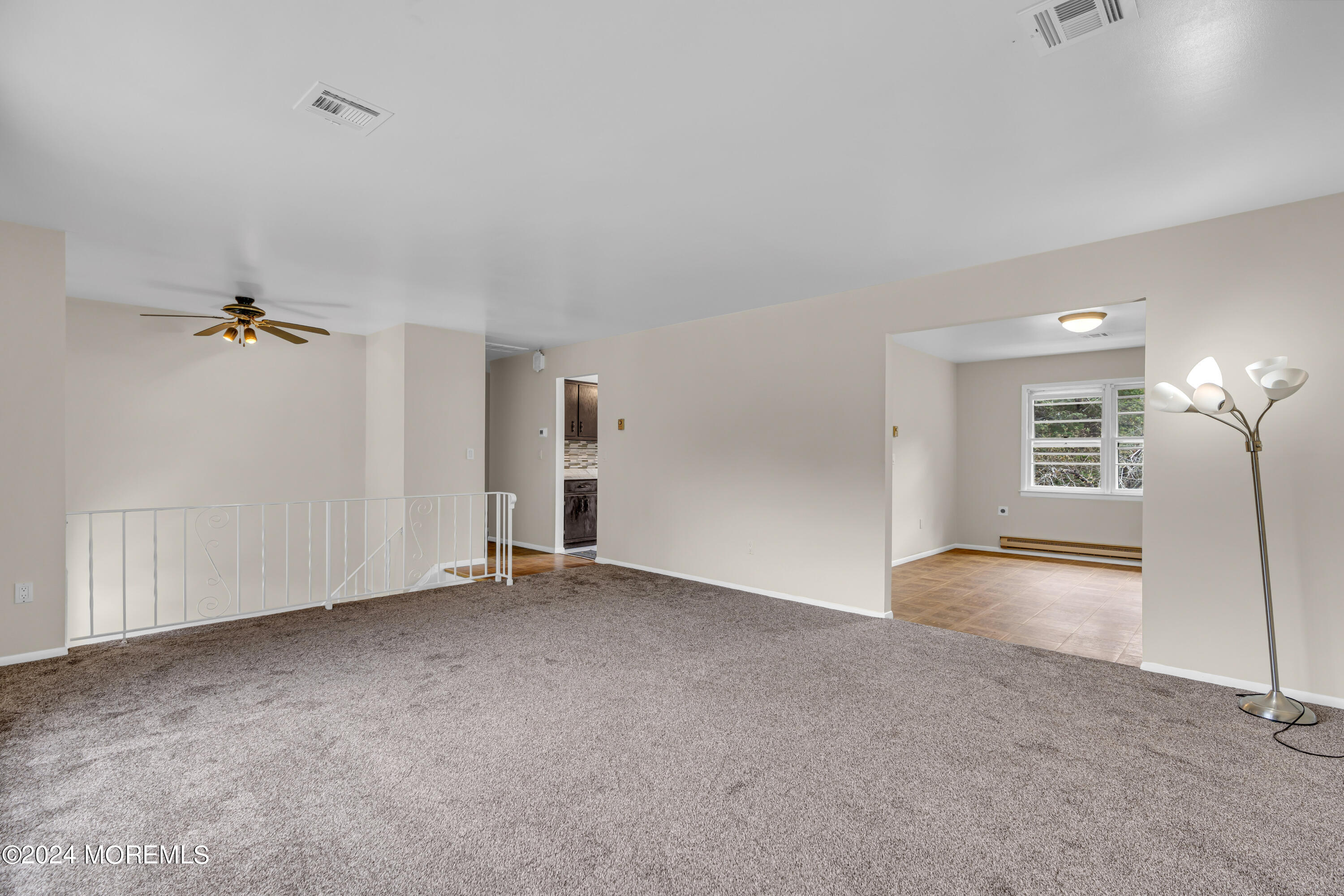 419 Cook Road Jackson, NJ 08527 - Photo 7 of 36 a view of an empty room with a window