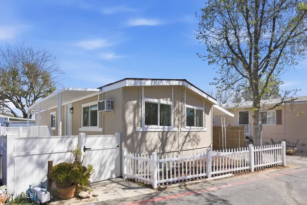 a front view of a house with a porch
