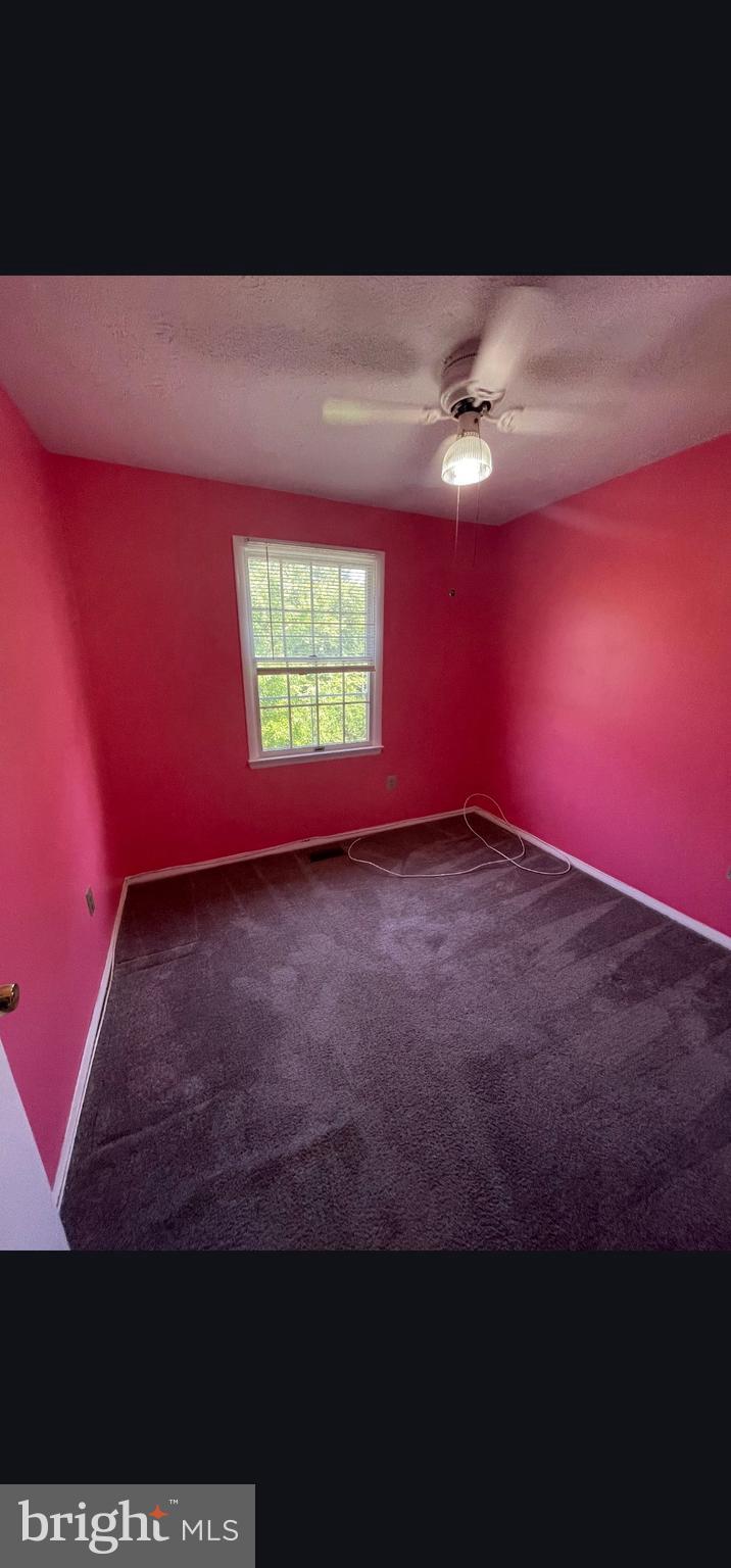 822 Joshua Tree Court Owings Mills, MD 21117 - Photo 16 of 27 a view of an empty room with a window