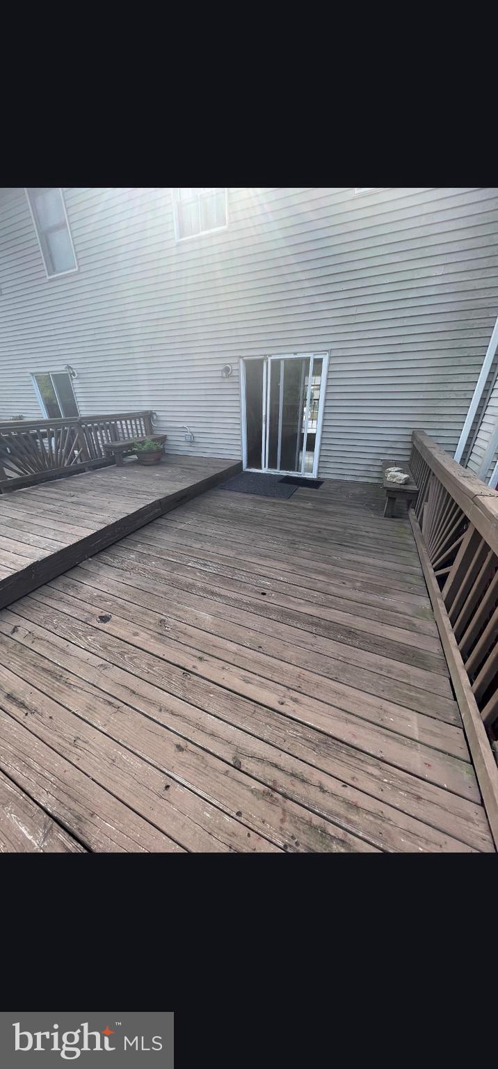 822 Joshua Tree Court Owings Mills, MD 21117 - Photo 22 of 27 a view of wooden floor and staircase
