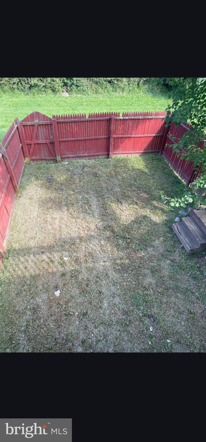 822 Joshua Tree Court Owings Mills, MD 21117 - Photo 23 of 27 a view of yard with patio