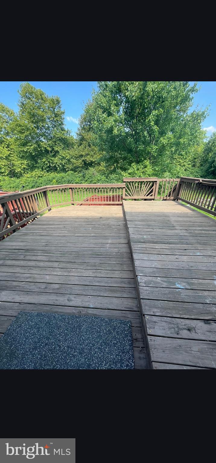 822 Joshua Tree Court Owings Mills, MD 21117 - Photo 10 of 27 a view of a swimming pool with a yard