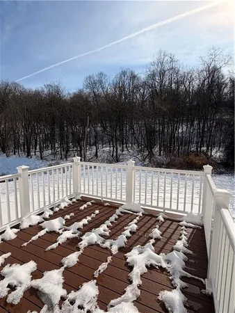 a view of a big room with closet and windows