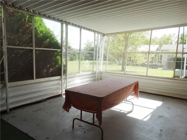 a living room with a large window