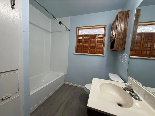 a bathroom with a sink and a tub