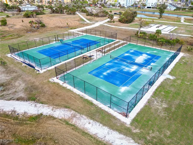 a view of a swimming pool and a yard