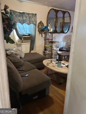 a kitchen with a refrigerator and a stove