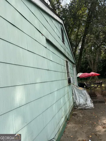 a view of a house with a patio