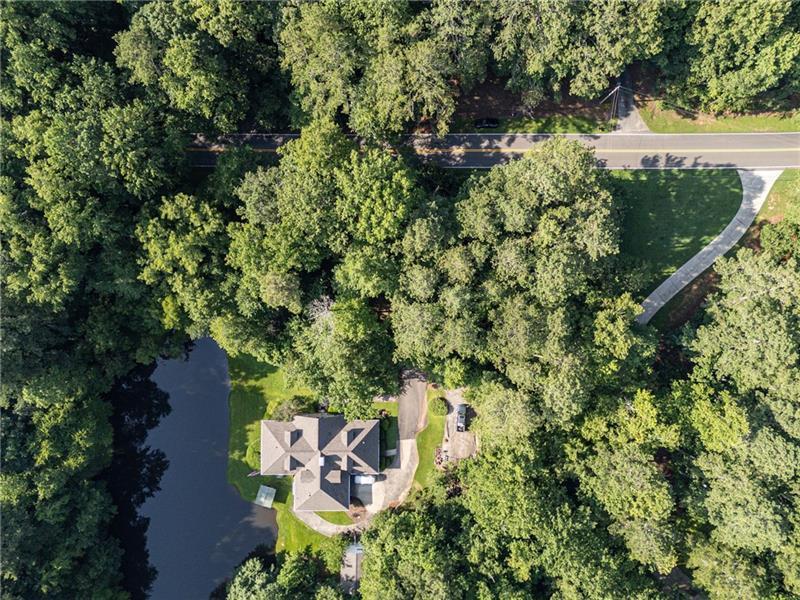 257 Ranchette Road Alpharetta, GA 30004 - Photo 11 of 17 an aerial view of a house with yard