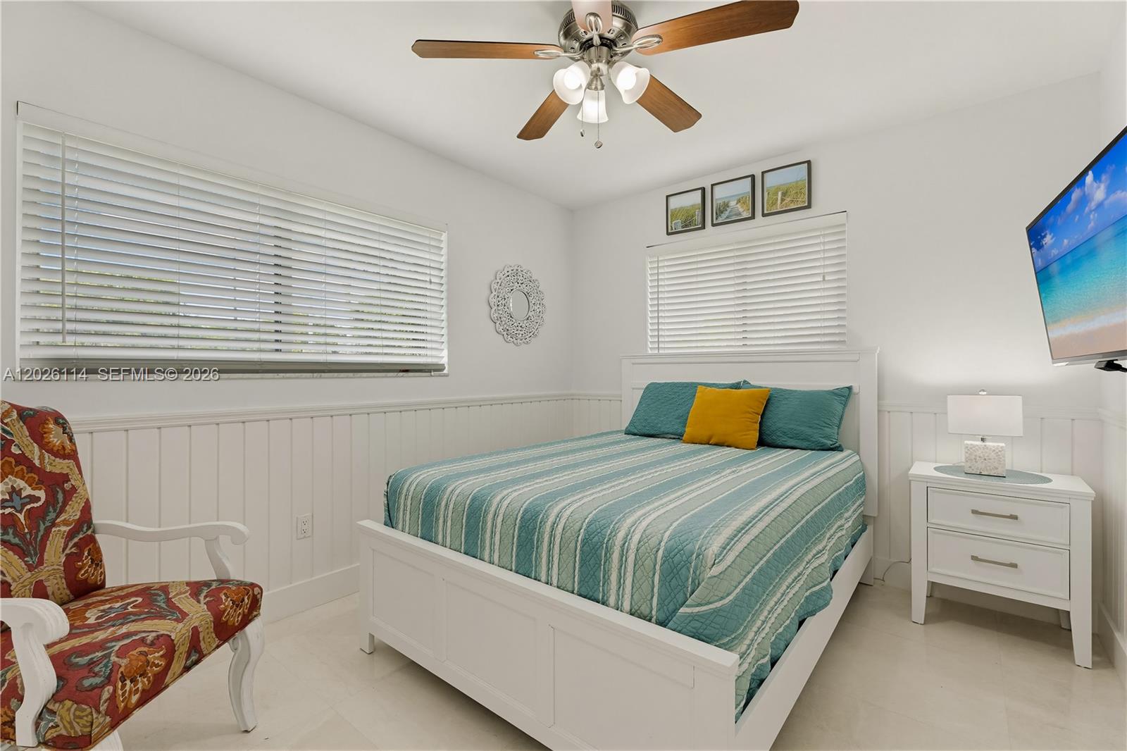 9641 Southwest 66th Street Miami, FL 33173 - Photo 25 of 57 a bedroom with a bed and a couch