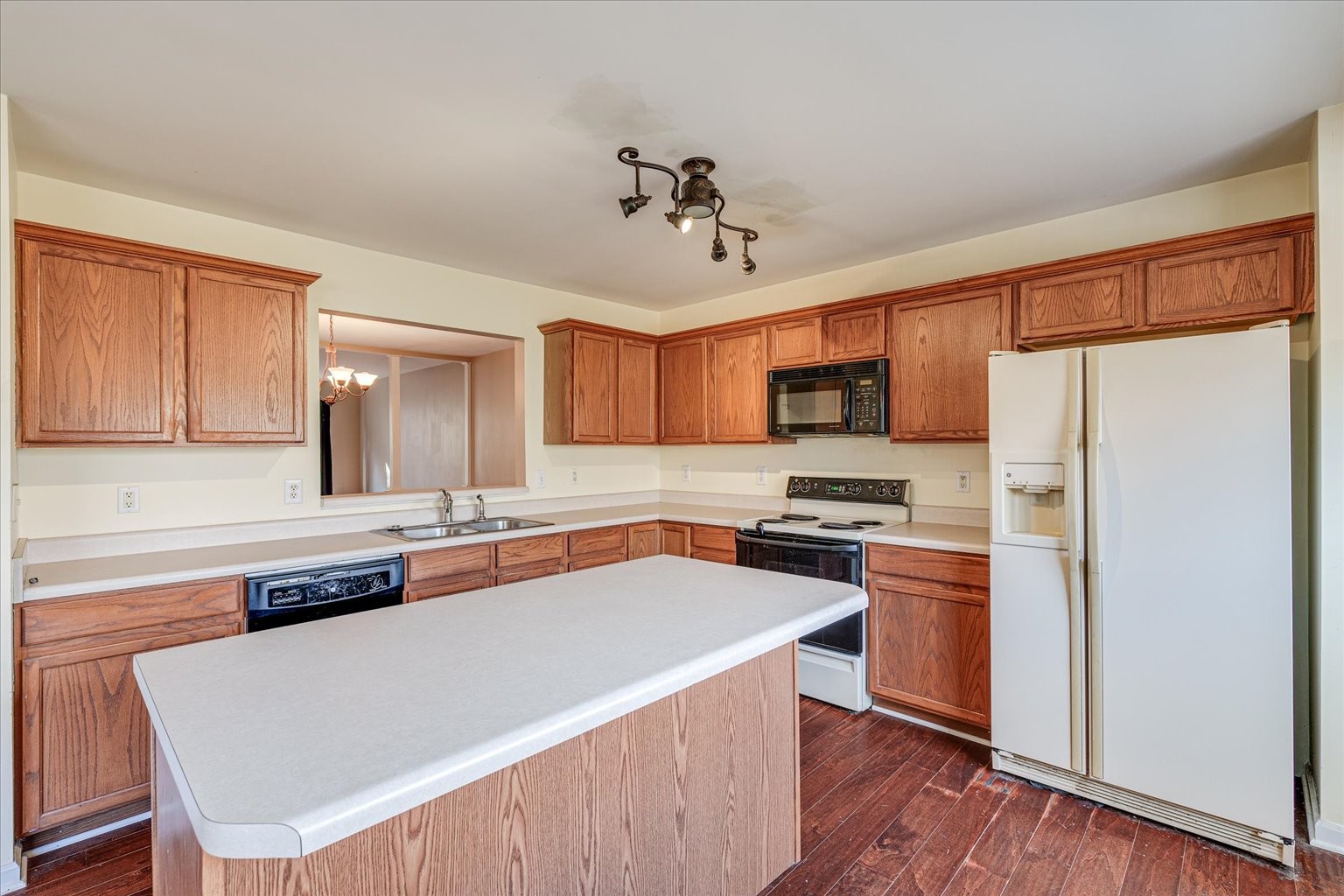 480 Huntington Ridge Drive Nashville, TN 37211 - Photo 12 of 21 a kitchen with stainless steel appliances a stove a sink dishwasher a refrigerator white cabinets and wooden floor