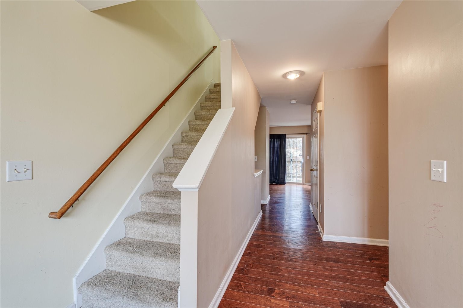 480 Huntington Ridge Drive Nashville, TN 37211 - Photo 14 of 21 a view of a hallway with wooden floor and staircase
