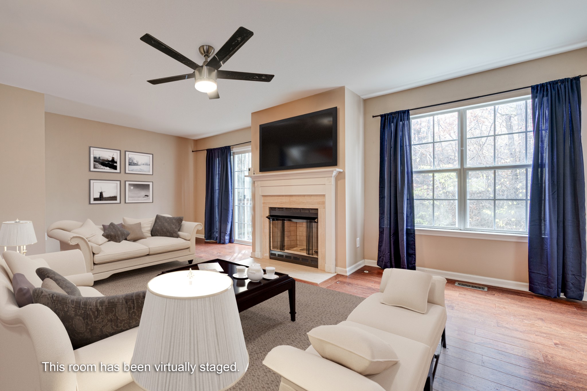 480 Huntington Ridge Drive Nashville, TN 37211 - Photo 7 of 21 a living room with furniture a fireplace and a flat screen tv