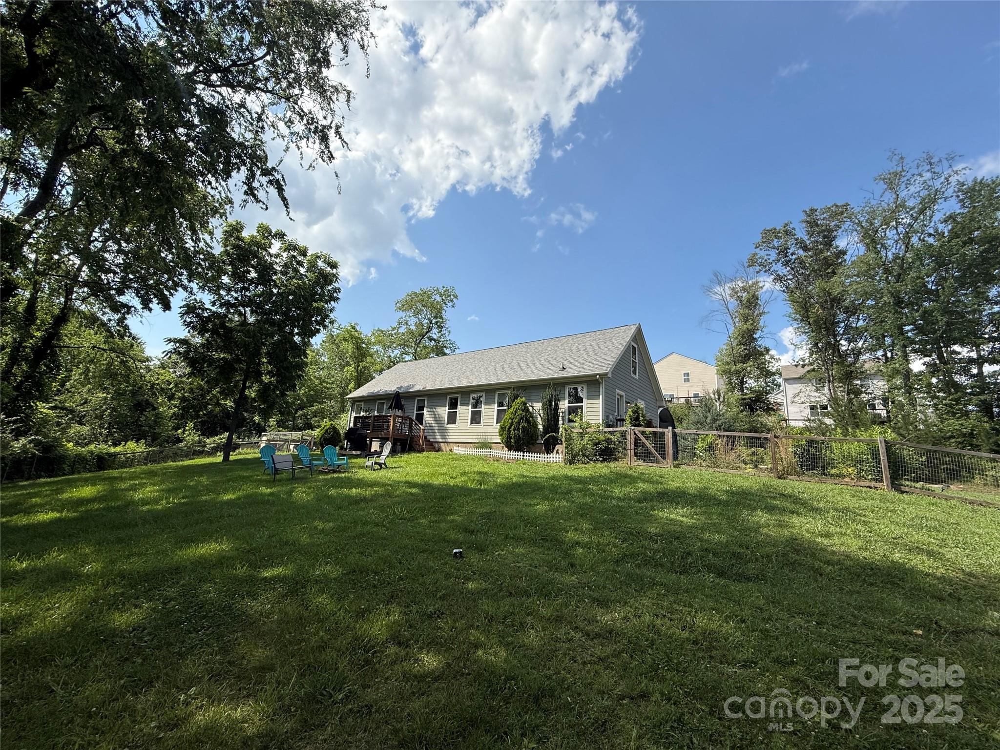 65 Owenby Road Candler, NC 28715 - Photo 5 of 8 a front view of a house with a yard