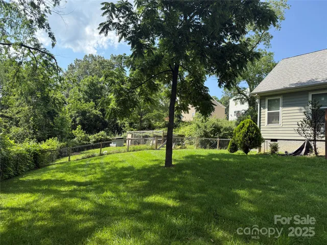a view of a backyard with a garden