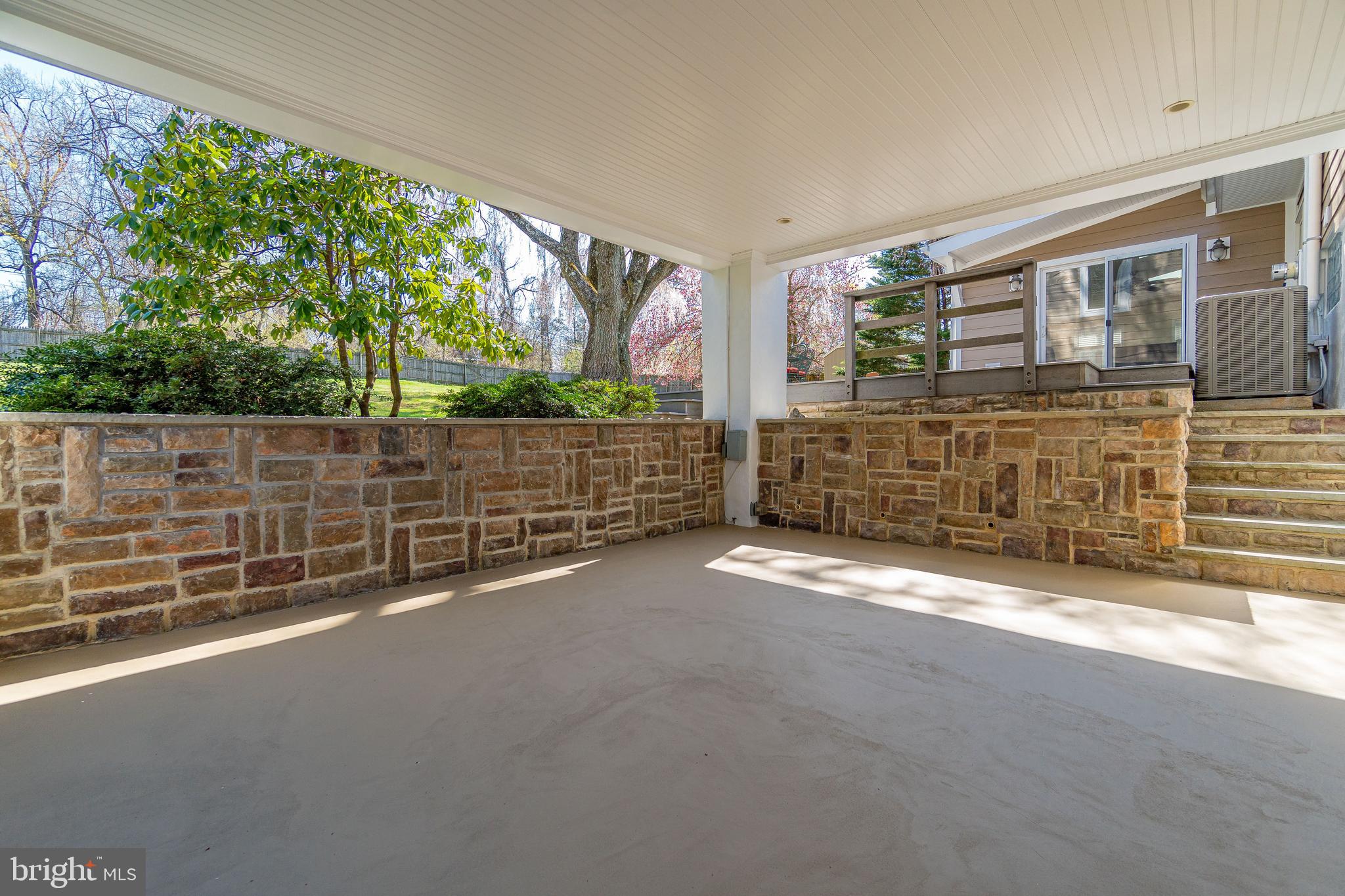 922 Hollow Road Wayne, PA 19087 - Photo 36 of 59 Covered Patio - steps down from Deck