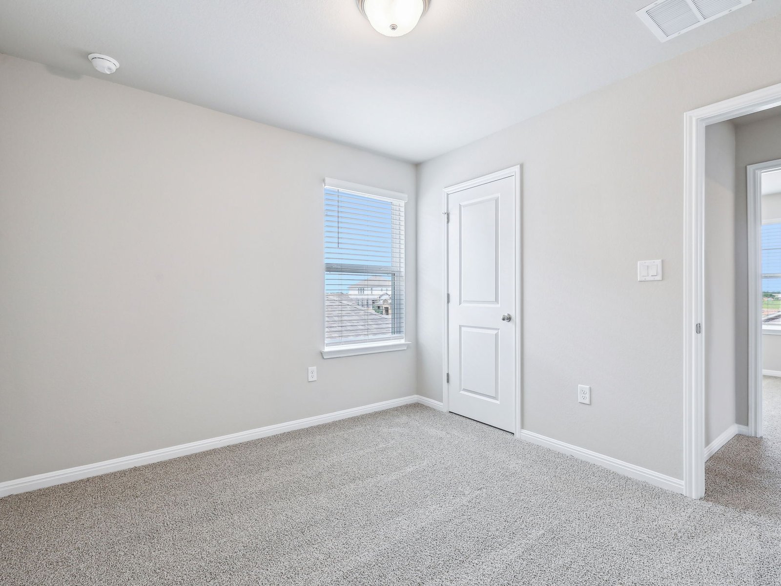 113 Maple Hedge Road Hutto, TX 78634 - Photo 14 of 20 a view of an empty room with a window