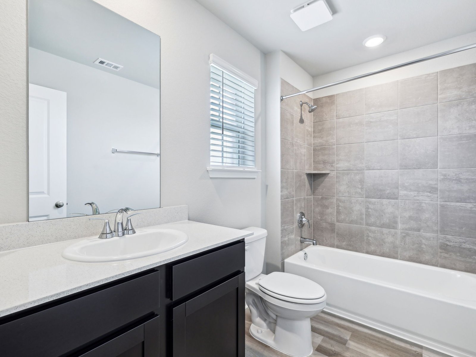 113 Maple Hedge Road Hutto, TX 78634 - Photo 18 of 20 a bathroom with a sink a toilet and shower