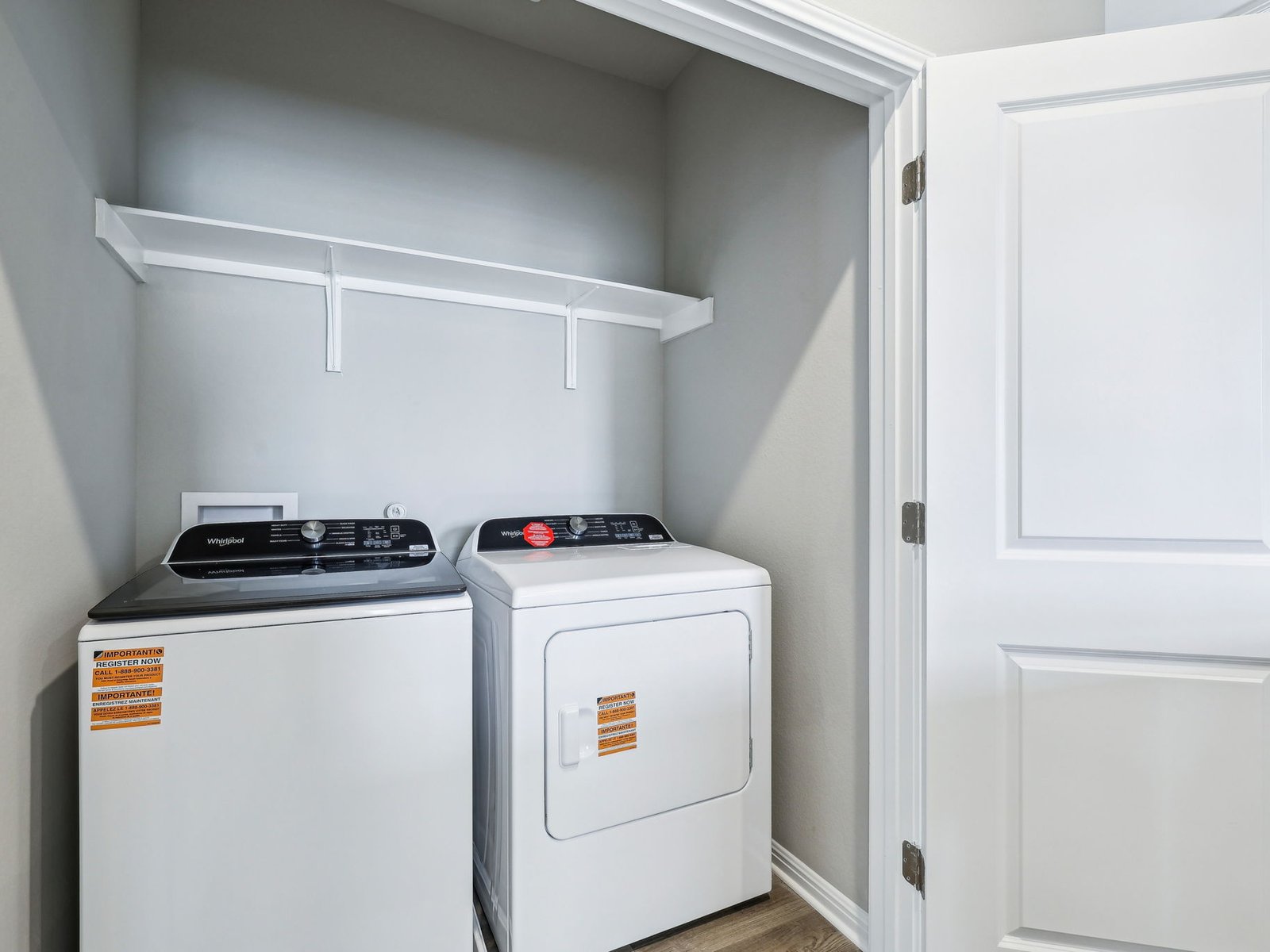 113 Maple Hedge Road Hutto, TX 78634 - Photo 19 of 20 a utility room with dryer and washer