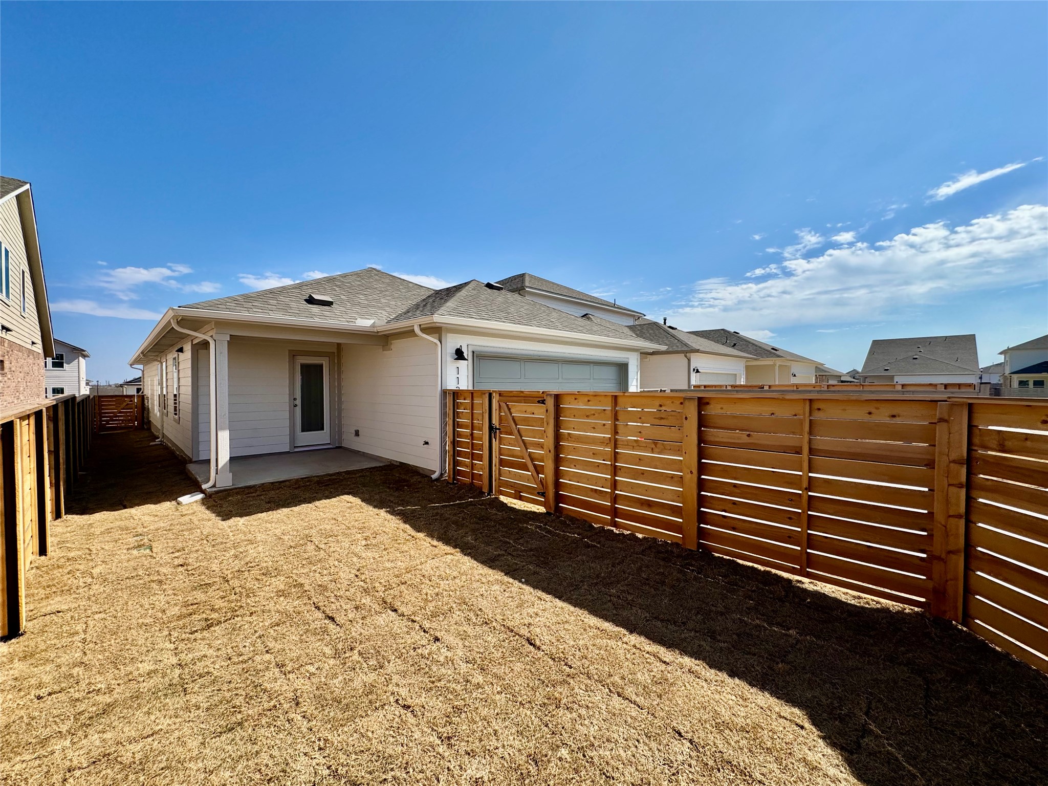 113 Maple Hedge Road Hutto, TX 78634 - Photo 5 of 20 a front view of a house with a yard