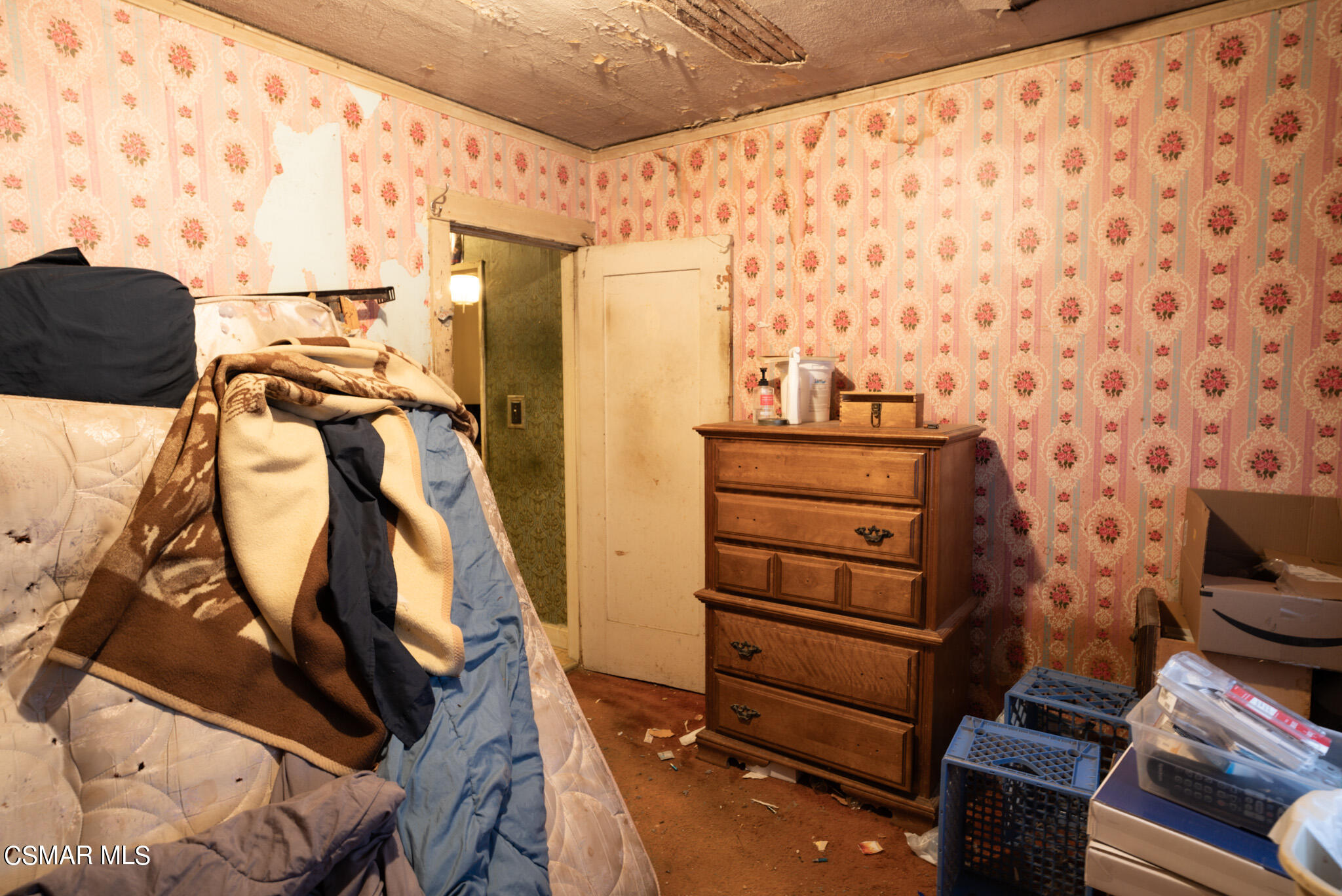 5829 Tipton Way Los Angeles, CA 90042 - Photo 13 of 20 a view of walk in closet with clothes