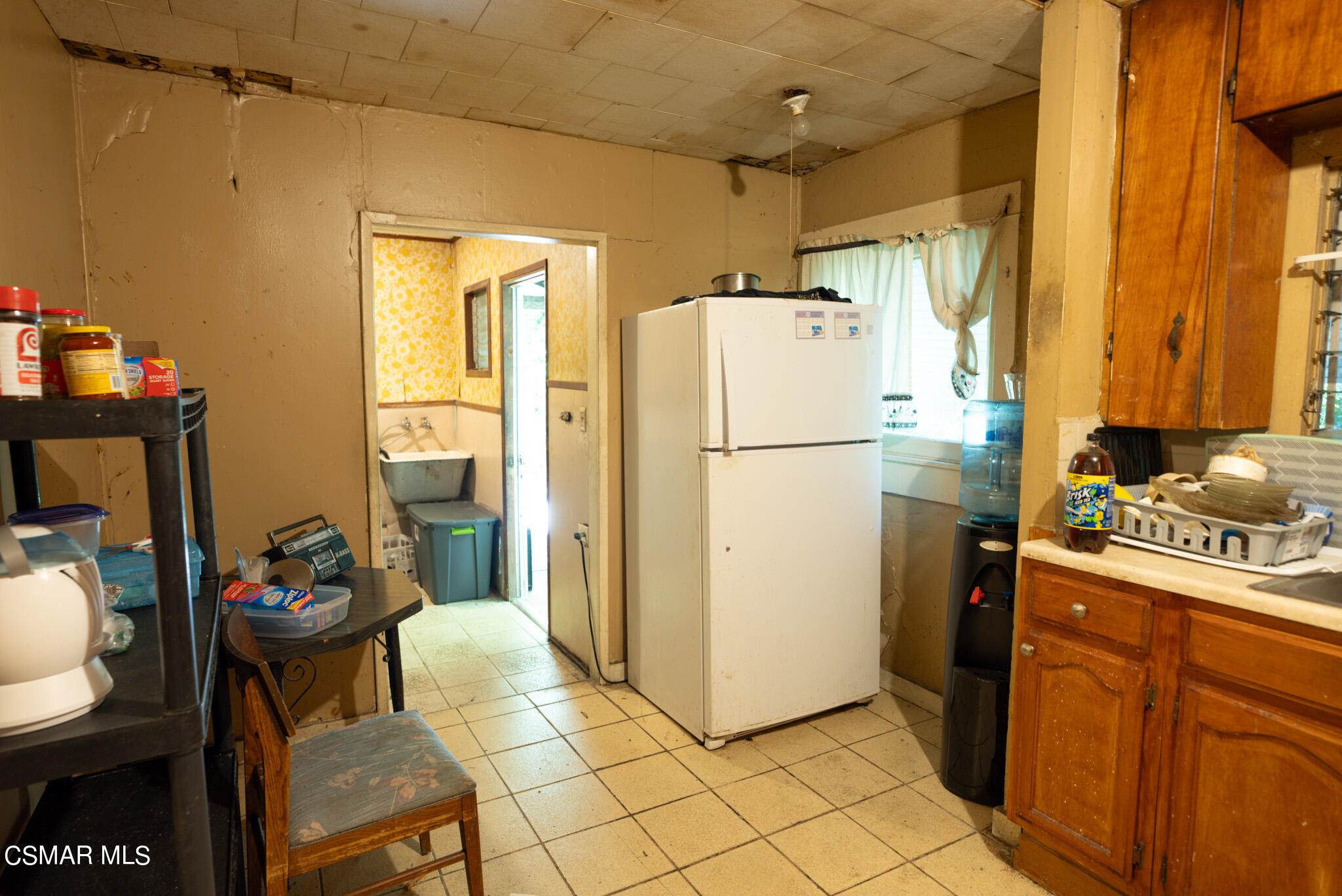 5829 Tipton Way Los Angeles, CA 90042 - Photo 3 of 20 a kitchen with stainless steel appliances a refrigerator and a stove
