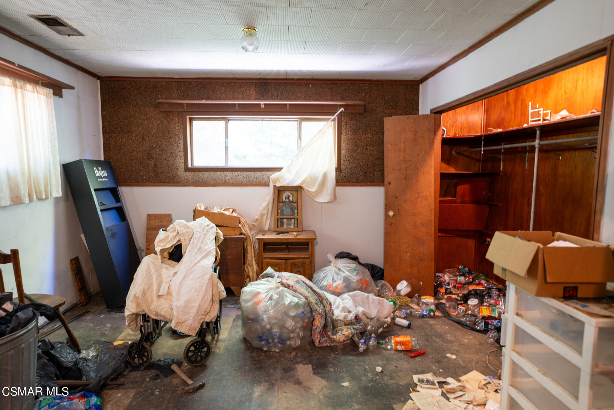 5829 Tipton Way Los Angeles, CA 90042 - Photo 10 of 20 a bedroom with furniture and a window