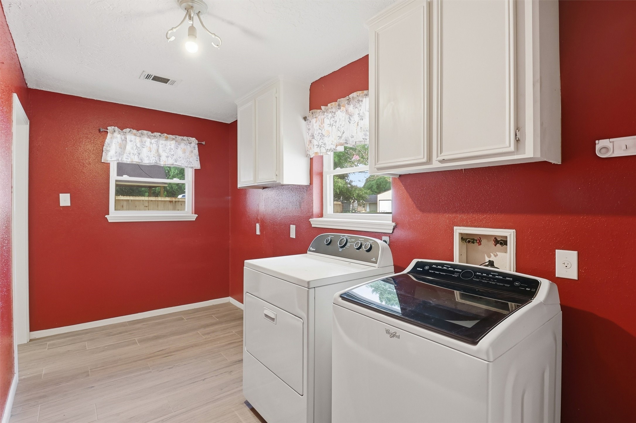 22923 Tomball Cemetery Road Tomball, TX 77377 - Photo 35 of 50 Look at this spacious utility room! Love the extra storage and windows!