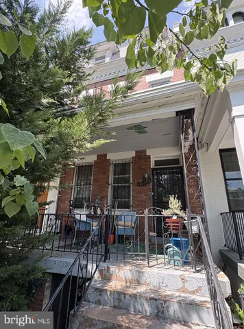 a view of dinning table and chairs in patio