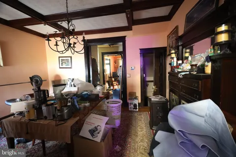 a view of a workspace with furniture and toys