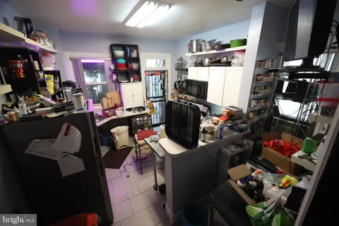 a picture of a bathroom with a sink and a mirror