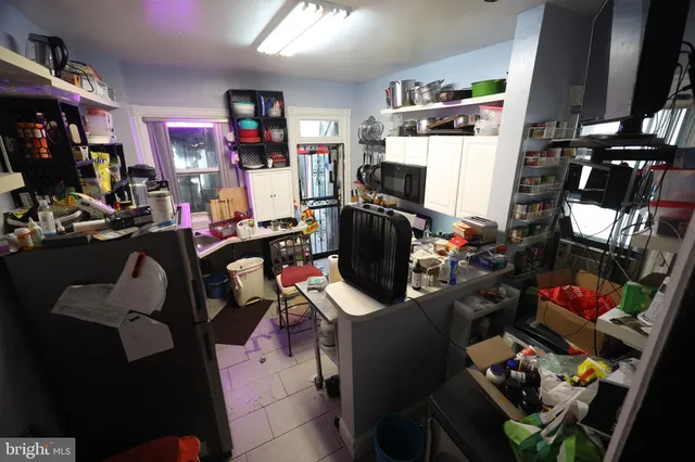 a picture of a bathroom with a sink and a mirror
