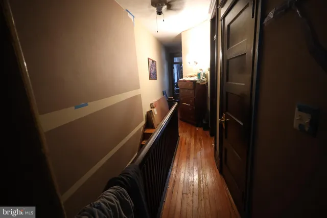 a bed room with a bed and a chandelier