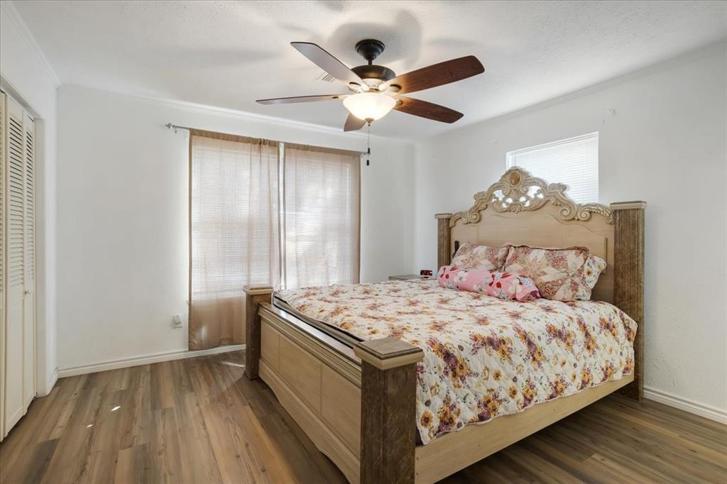 567 Celtic Road Howe, TX 75459 - Photo 20 of 40 a bedroom with a bed and window