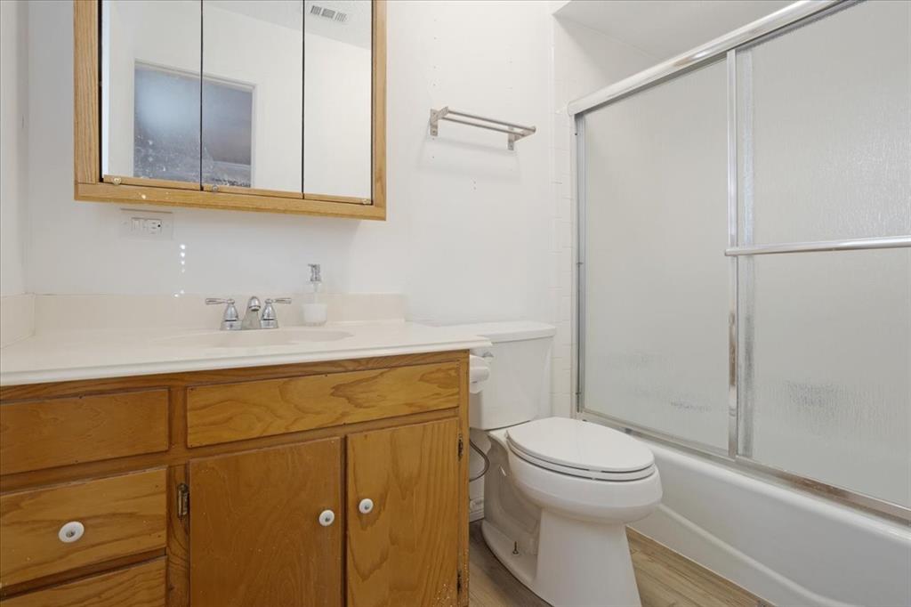 567 Celtic Road Howe, TX 75459 - Photo 22 of 40 a bathroom with a sink a toilet and shower
