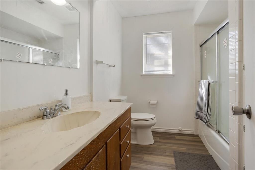 567 Celtic Road Howe, TX 75459 - Photo 24 of 40 a bathroom with a sink toilet and shower